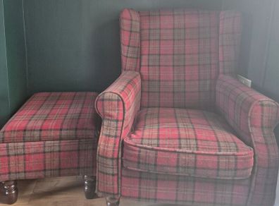 Large wingback chair and foot stool