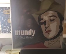 Mundy 24 star hotel signed red vinyl