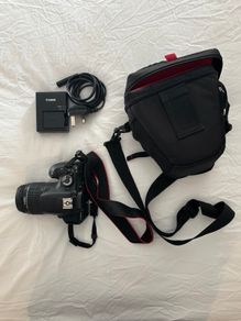 Canon EOS Twelve Hundred D Camera With Eighteen Fifty Five Lens