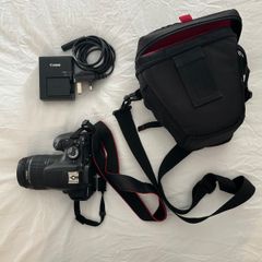 Canon EOS Twelve Hundred D Camera With Eighteen Fifty Five Lens