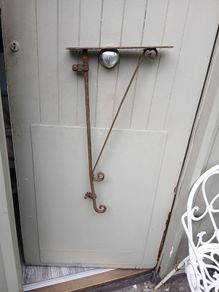 antique swing sign bracket