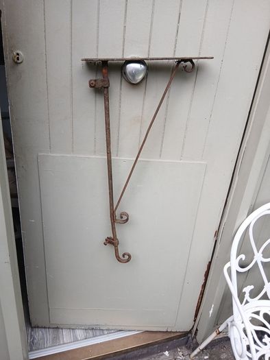 antique swing sign bracket