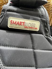 Children's riding vest and helmet