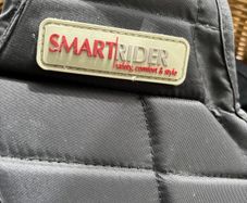 Children's riding vest and helmet
