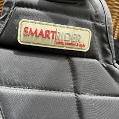 Children's riding vest and helmet