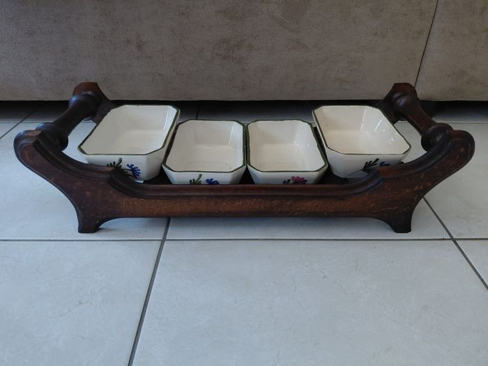 Vintage wooden serving tray with four ramekins