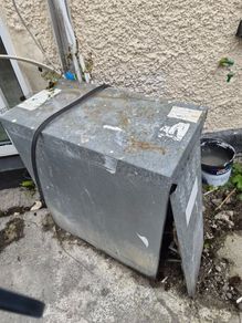 Oil tank and hot water cylinder
