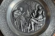 Vintage pewter wall hanging plates