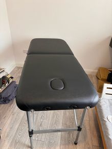 Massage table