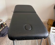 Massage table