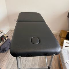 Massage table