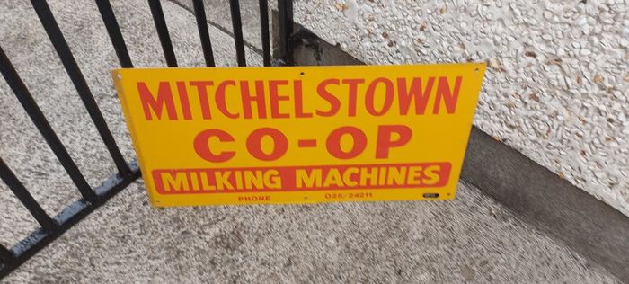 Mitchelstown hay barn advertising,sign by currans of Clonmel,,original ,came out of the offices in mitchelstown branch ,,,few marks  ,lovely advertising display item, for any garage ,man cave or personal collection, sold as is