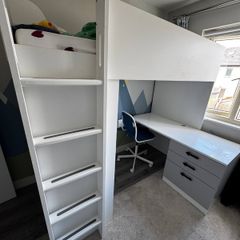 Bed with wardrobe and desk