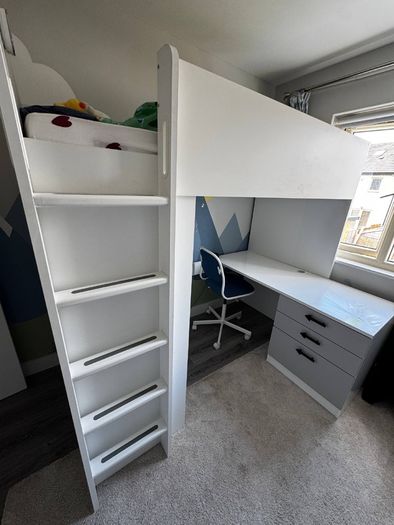 Bed with wardrobe and desk