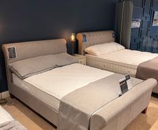 King size upholstered grey bed