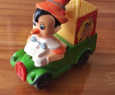 Vintage Toy Pinocchio Car
