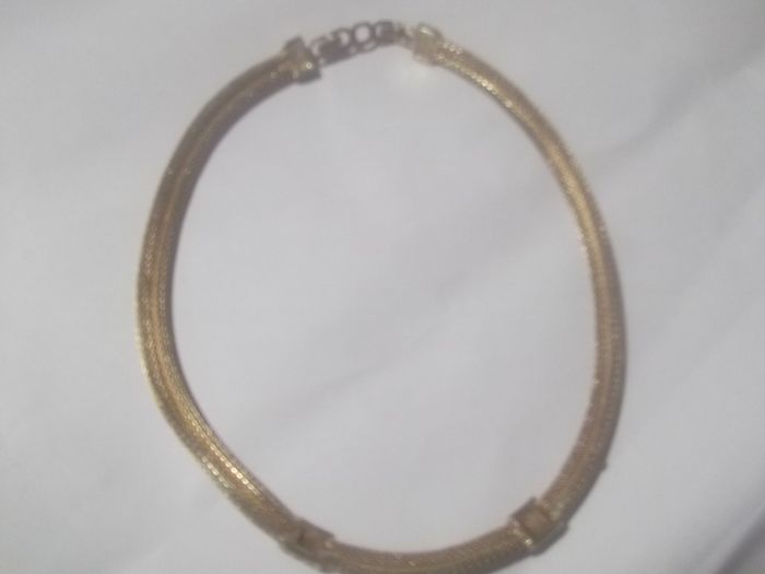 a christian dior necklace gold colour j