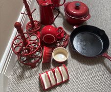 A bundle of Red Cooking Utensils- Pots, Pans . Cast Iron, Ceramic, Enamel etc