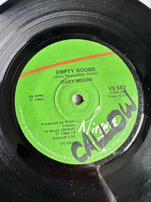Gary Moore. Empty rooms single. Vinyl would be nm except for writing on 1 label