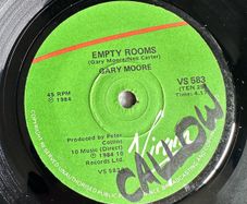 Gary Moore. Empty rooms single. Vinyl would be nm except for writing on 1 label
