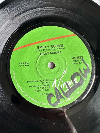 Gary Moore. Empty rooms single. Vinyl would be nm except for writing on 1 label