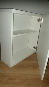 2 wall mounted cabinets