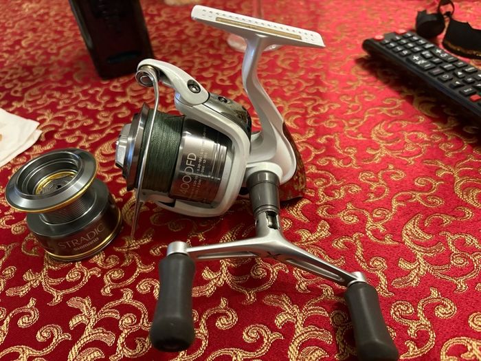 shimano stradic 4000 with spare spool and spiderwire braid