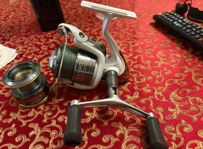 shimano stradic 4000 with spare spool and spiderwire braid