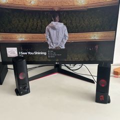 monitor, speakers and gaming chair set