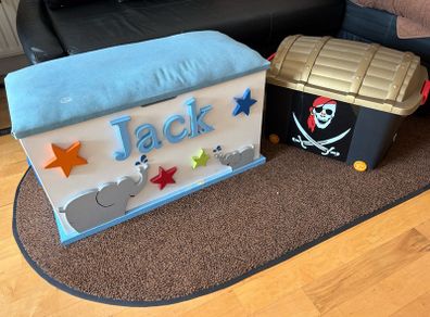 x2 Toy storage boxes Personalized white toy box features a light blue cushioned seat, the name "Jack" and pirate plastic box with lead