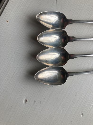 4 excellent condition Irish silver teaspoons 5 and 1/4 inches long weighing 65 grams. Made by Joseph Henzell in 1807 in Dublin.
