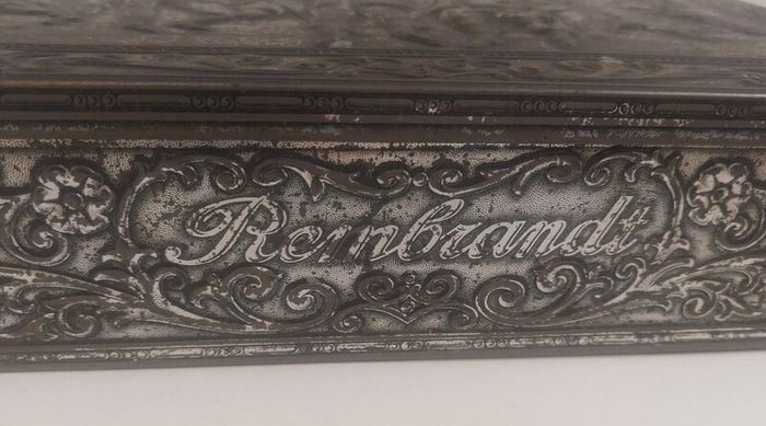 Fabulous Rembrandt's The Night Watch Vintage Hinged Biscuit Tin with a Raised Relief Reproduction of the Famous Painting, Attributed to the Victoria Biscuit Company of Holland