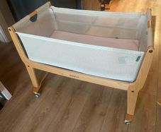 Beside me Snuzpod and Moses basket