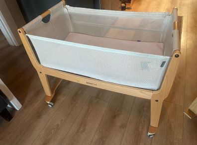 Beside me Snuzpod and Moses basket