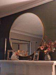 Round gold mirror
