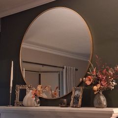 Round gold mirror