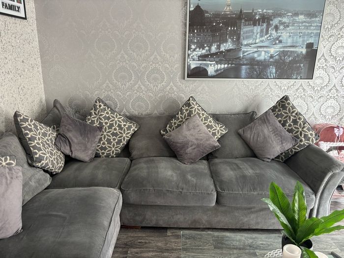 corner sofa and pouffe