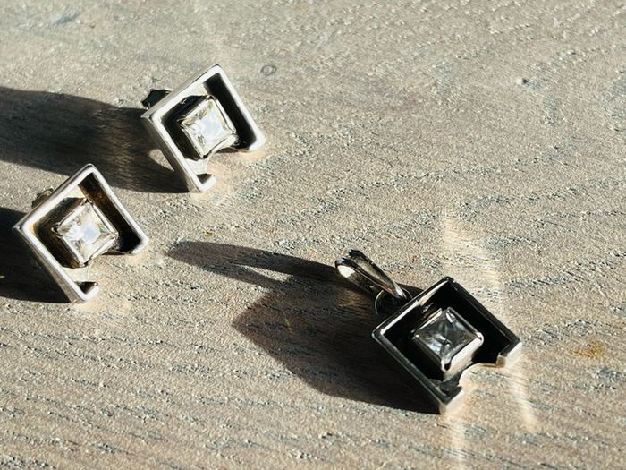 Silver set of bracelet ,earrings and pendant