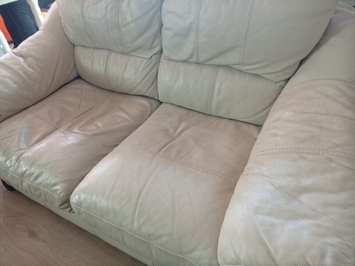 2 cream leather 2 seater sofa s