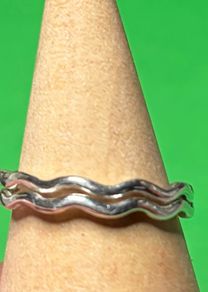 Handmade sterling silver wave rings. Size K