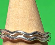 Handmade sterling silver wave rings. Size K