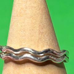 Handmade sterling silver wave rings. Size K