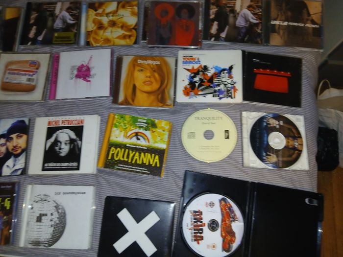 Collection of 58 assorted music CDs