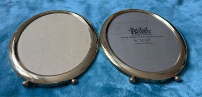 2 Vintage Solid Brass Oval Footed Picture Frames.