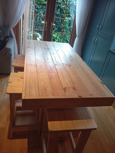 Rustic kitchen island with triple overhang