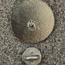 Radiation warning symbol, pin back badge. Image 2