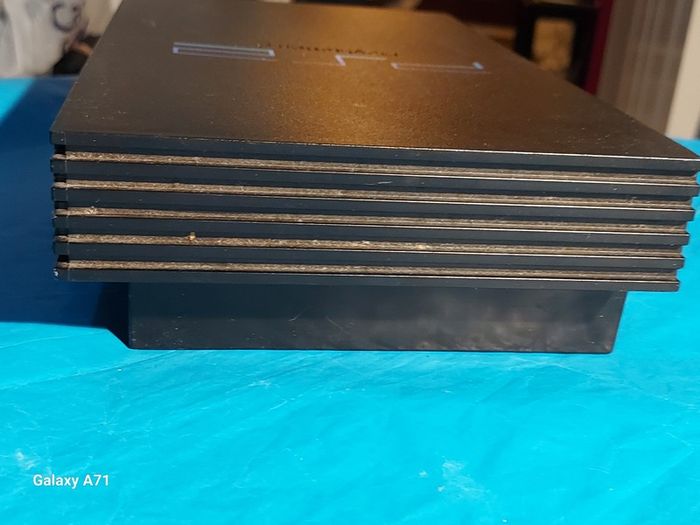 Playstation 2 Model SCPH-30003 R, Powers on and off, Opens and closes disk tray, Comes with power lead only