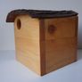 Birdhouse with bark roof Image 3
