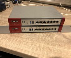 Two ZyXel USG 100 Router/ unified security gateway