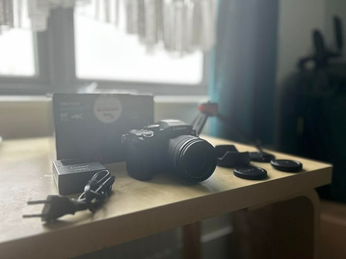 Panasonic Lumix G7 (Open Box) + 12-60 lens + Camera Bag + Stand and more